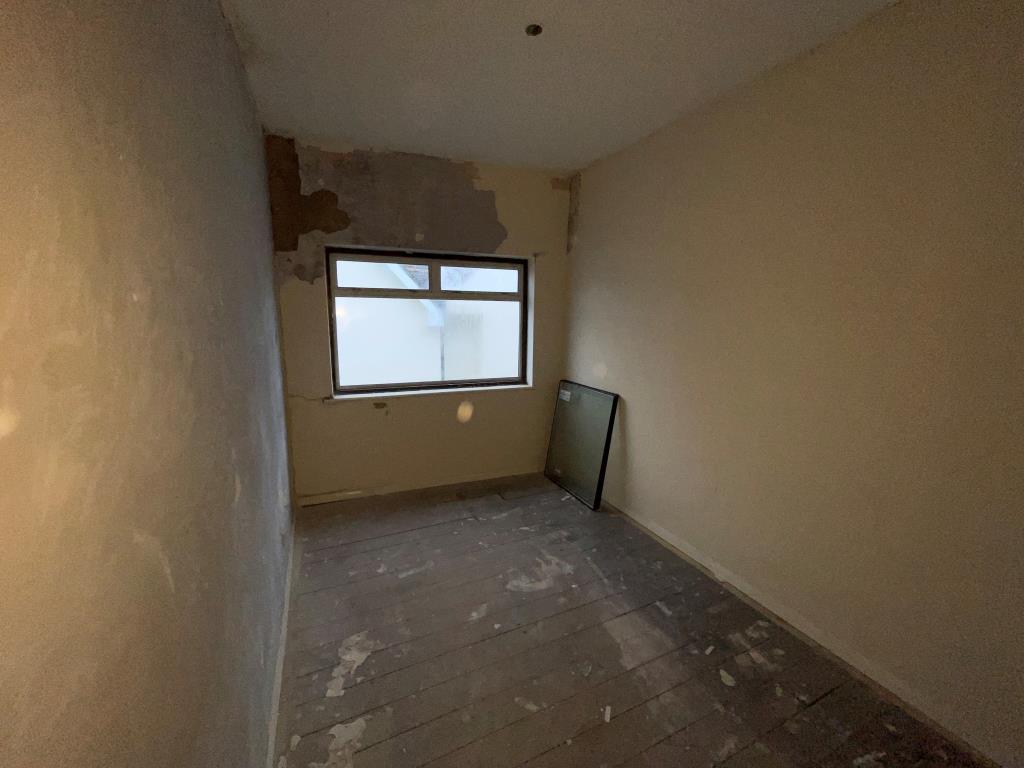 Lot: 57 - FLAT FOR REFURBISHMENT/COMPLETION - Bedroom stripped back with window